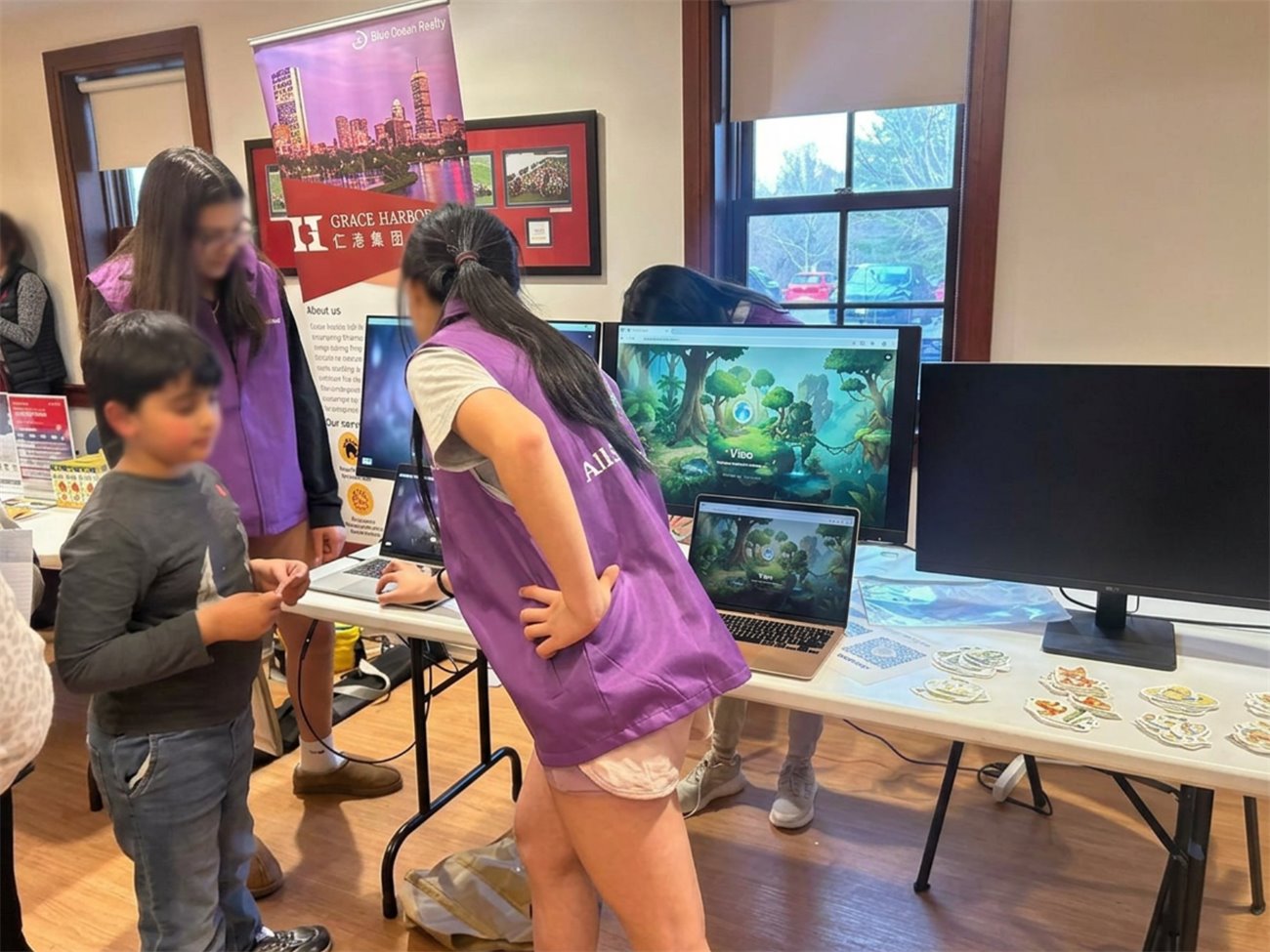 Kids writing AI image prompts at the STEM Expo